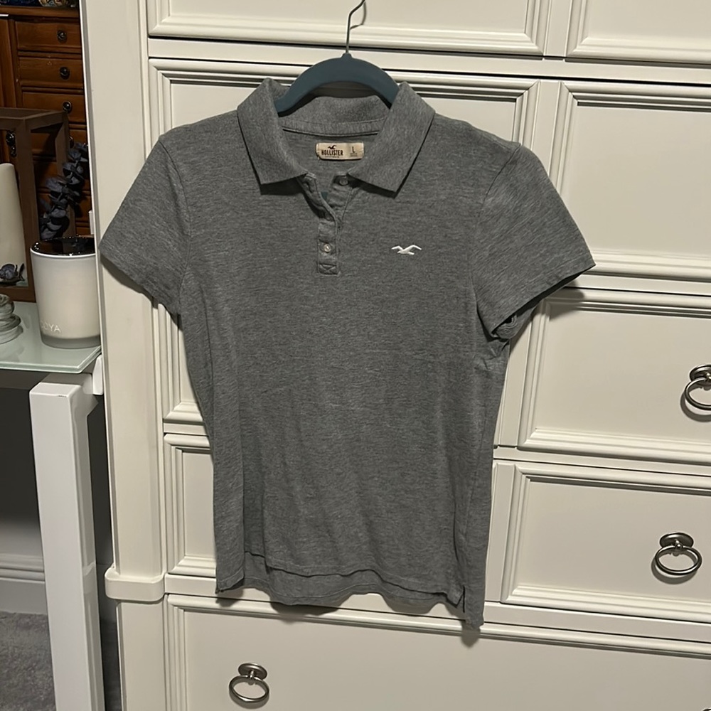 Gray Hollister Collar shirt that is a size Large